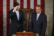 Incoming House Speaker Paul Ryan, R-Wis., salutes the members of the House as he stands with outgoing Speaker John Boehner, R-Ohio, after Ryan was elected on Capitol Hill in Washington Oct. 29. Ryan received 236 votes. (CNS photo/Gary Cameron, Reuters) 