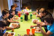 A family that chooses to watch TV or play with their smartphones rather than talk at the dinner table is "hardly a family," Pope Francis said. (CNS photo/Lisa Johnston, St. Louis Review)