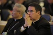 Bishop Oscar Cantu of Las Cruces, N.M., prays on Nov. 16 during the opening of the 2015 fall general assembly of the U.S. Conference of Catholic Bishops in Baltimore. (CNS photo/Bob Roller)