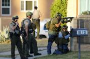 Police officers conduct a manhunt after a mass shooting in San Bernardino, Calif., on Dec. 2. (CNS photo/Mike Blake, Reuters)