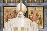 Pope Francis opens the Holy Door of St. Peter's Basilica to inaugurate the Jubilee Year of Mercy at the Vatican Dec. 8. (CNS photo/Maurizio Brambatti, EPA)