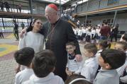 Cardinal Timothy M. Dolan of New York embraces Dominican Sister Muntahah Haday at the Al Bishara School run by the Dominican Sisters of St. Catherine of Siena in Ankawa, Iraq, April 9. (CNS photo/Paul Jeffrey)