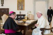 Pope Francis talks with Archbishop Christophe Pierre, the new apostolic nuncio to the United States, during an April 21 meeting at the Vatican. (CNS photo/L'Osservatore Romano)