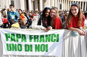 Young pilgrims display a banner that says "Pope Francis One of us" as the pontiff celebrates Mass for the Youth Jubilee in St. Peter's Square at the Vatican in April 2016. (CNS photo/Ettore Ferrari, EPA)