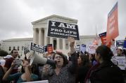 A pro-life supporter in front of the U.S. Supreme Court in June 2016. (CNS photo/Andrew Gombert, EPA)