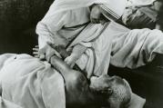 Blessed Teresa of Kolkata cares for a sick man in an undated photo. (CNS photo/KNA)