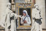 A tapestry of St. Teresa of Kolkata is seen on the facade of St. Peter's Basilica as Pope Francis celebrates her canonization Mass at the Vatican Sept. 4. (CNS photo/Paul Haring) 