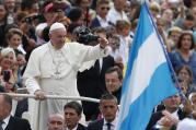 Argentina's flag is seen as Pope Francis arrives to lead his general audience in St. Peter's Square at the Vatican on Sept. 7. (CNS photo/Paul Haring)