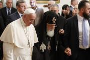 Pope Francis and Orthodox Patriarch Ilia II of Georgia arrive for a meeting at the patriarchal palace in Tbilisi, Georgia, Sept. 30. (CNS photo/Paul Haring)