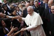 Pope Francis greets the faithful as he arrives to celebrate Mass at the Church of the Immaculate Conception in Baku, Azerbaijan, Oct. 2. (CNS photo/Paul Haring)