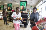 During a previous spasm of unrest related to xenophobia, protesters are seen looting a shop at a gas station in 2016 in Pretoria, South Africa. (CNS photo/Herman Verwey, EPA)