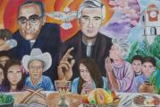 A mural in El Paisnal, El Salvador, seen in this Jan. 29 photo, features Blessed Oscar Romero and town native Father Rutilio Grande, surrounded by rural men, women and children, the community the Jesuit Father Grande served from 1972 until his March 12, 1977, assassination. (CNS photo/Rhina Guidos)