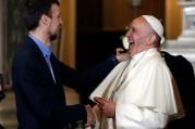 Pope Francis laughs as he speaks with a man in the Shrine of Our Lady of the Watch during his May 27 pastoral visit in Genoa, Italy. (CNS photo/Alessandro Garofalo, Reuters) 