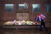 A person walks past a memorial for victims of the London Bridge terror attacks in London, on June 6. Archbishop Peter Smith of Southwark, the archdiocese that covers London south of the River Thames, offered prayers for the victims, survivors and first responders. (CNS photo/Will Oliver, EPA)