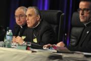 Cardinal Daniel N. DiNardo of Galveston-Houston, who is president of the U.S. Conference of Catholic Bishops, center, speaks on June 14 during the opening of the bishops' annual spring assembly in Indianapolis. (CNS photo/Sean Gallagher, The Criterion)