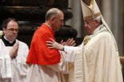 Pope Francis embraces Cardinal Juan Jose Omella of Barcelona, Spain, as the pontiff leads a consistory in St. Peter's Basilica at the Vatican June 28. The Spaniard was one of five men elevated to cardinal at the service. (CNS photo/Paul Haring) 