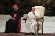 Pope Francis speaks during his general audience in Paul VI hall at the Vatican Aug. 8. Also pictured is Archbishop Georg Ganswein, prefect of the papal household. (CNS photo/Paul Haring) 