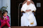 A teenager looks on as Pope Francis smiles during his visit to the Sanctuary of the Holy House on the feast of the Annunciation in Loreto, Italy, March 25. (CNS photo/Yara Nardi, Reuters) 