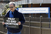 Pro-life advocate Joe San Pietro participates in a 40 Days for Life vigil near the entrance to a Planned Parenthood center in Smithtown, N.Y., on March 26. (CNS photo/Gregory A. Shemitz)