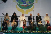 Pope Francis sits near young people as he attends a meeting for peace with Bulgarian representatives of various religious in Nezavisimost Square in Sofia, Bulgaria, May 6, 2019. (CNS photo/Paul Haring)