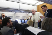 Pope Francis with reporters aboard his flight from Skopje, North Macedonia, to Rome on May 7, 2019. (CNS photo/Paul Haring) 