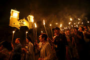 Catholics holding torches leave Urakami Cathedral in Nagasaki, Japan, Aug. 9, 2015, after praying for victims of the 1945 atomic bombing. Pope Francis will finally fulfill his desire to be a missionary to Japan when he visits the country, as well as Thailand, Nov. 20-26, 2019, the Vatican announced Sept. 13. (CNS photo/Toru Hanai, Reuters)