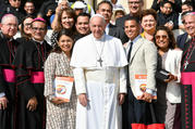 Pope Francis poses for a photo on Sept. 18 with members of a U.S. delegation that traveled to Rome to present the results of the Fifth National Encuentro to the pope and top Vatican officials. 