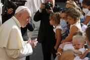 Pope Francis greets people as he arrives for his general audience in the San Damaso courtyard at the Vatican Sept. 9, 2020. (CNS photo/Paul Haring)