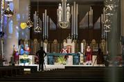 Bishop John E. Stowe of Lexington, Ky., celebrates Palm Sunday Mass in his diocese's nearly empty Cathedral of Christ the King April 5, 2020, amid the coronavirus pandemic. (CNS photo/Deacon Skip Olson, courtesy Diocese of Lexington)