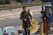 An Israeli soldier guards at the Gush Etzon Settlements junction near Bethlehem, West Bank, May 10, 2020. The settlements in the Gush Etzon region would be included in the proposed annexation plan by Israeli Prime Minister Benjamin Netanyahu. (CNS photo/Debbie Hill) 