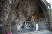 Pope Francis prays at a replica of the Lourdes Grotto in the Vatican Gardens in this 2013 file photo. Pope Francis will pray there May 30, the eve of Pentecost, leading the major shrines around the world in praying the rosary to implore Mary's intercession and protection amid the coronavirus pandemic. (CNS photo/L'Osservatore Romano) 