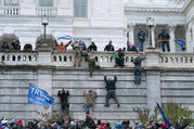 Insurrectionists scale the west wall of the the U.S. Capitol in Washington on Jan. 6, 2021. (AP Photo/Jose Luis Magana, File)