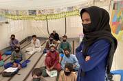 Children attend a Catholic Relief Services school in a camp for displaced people on the outskirts of Herat. Photo courtesy of Kevin Hartigan/Catholic Relief Services.