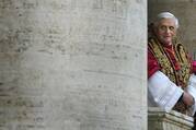 Newly elected Pope Benedict XVI greets thousands of pilgrims from the balcony of St. Peter's Basilica after his election as pope at the Vatican in this April 19, 2005, file photo. (CNS photo/Kai Pfaffenbach, Reuters)
