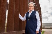 Sister Norma Pimentel, a member of the Missionaries of Jesus, is pictured along a border wall between Texas and Mexico in late February 2018. (CNS photo/Barbara Johnston, courtesy University of Notre Dame)