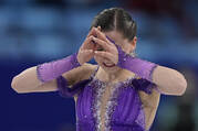 Kamila Valieva, of the Russian Olympic Committee, reacts in the women's short program during the figure skating at the 2022 Winter Olympics, Feb. 15,, in Beijing. (AP Photo/David J. Phillip)