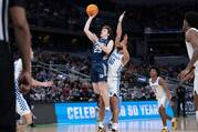 Doug Edert of St. Peter's University shoots against the University of Kentucky at Gainbridge Fieldhouse in Indianapolis March 17, 2022.