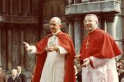 Pope Paul VI and the future Pope John Paul stand side-by-side before a crowd