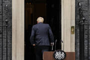 Prime Minister Boris Johnson enters 10 Downing Street, after his reading a resignation statement in London, July 7 (AP Photo/Alberto Pezzali, file).