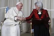 The pope shakes hands with Mary Simon, the governor general of Canada