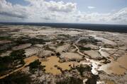 An area deforested by wildcat mining is seen in a zone known as Mega 14, in the southern Amazon region of Madre de Dios, Peru.