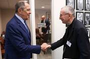 Two men shake hands at the United Nations