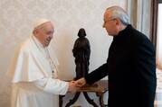 Pope Francis greets Jesuit Father Marko Rupnik during a private audience at the Vatican in this Jan. 3, 2022, file photo. 