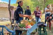 Subsistence farmers display crops