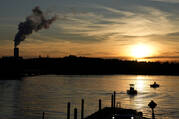 At left: the Marshall Steam Station coal power plant, near Mooresville, N.C. (AP Photo/Chris Carlson)