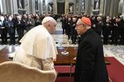 Pope Francis is greeted by Cardinal Angelo De Donatis, papal vicar of Rome, at the beginning of a meeting with priests and deacons working in the Diocese of Rome Jan. 13, 2024, in Rome's Basilica of St. John Lateran. (CNS photo/Vatican Media)