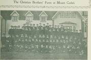 From the Newfoundland Quarterly in 1909: “The Orphan Boys at Mount Cashel, St. Johns, who sowed, reaped and threshed 600 bushels of oats this year at Mount Cashel.” (Wikimedia Commons)