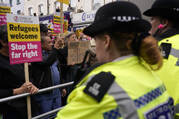 Police halt a counterprotest organized against a planned far-right anti-immigration protest in Walthamstow, London, on Aug. 7. (AP Photo/Alberto Pezzali)(AP Photo/Alberto Pezzali)
