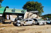 On Oct. 9, a flood damaged home along the Swannanoa River in Asheville, N.C., where residents will face a long road to recovery. Photo by Kevin Clarke.