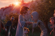 A still image from the animated film ‘King of Kings’ showing Jesus with a risen Lazarus 